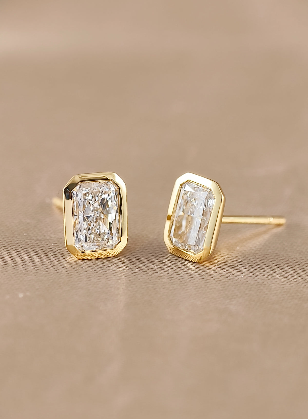 Auris Bezel Radiant Cut Stud Earrings