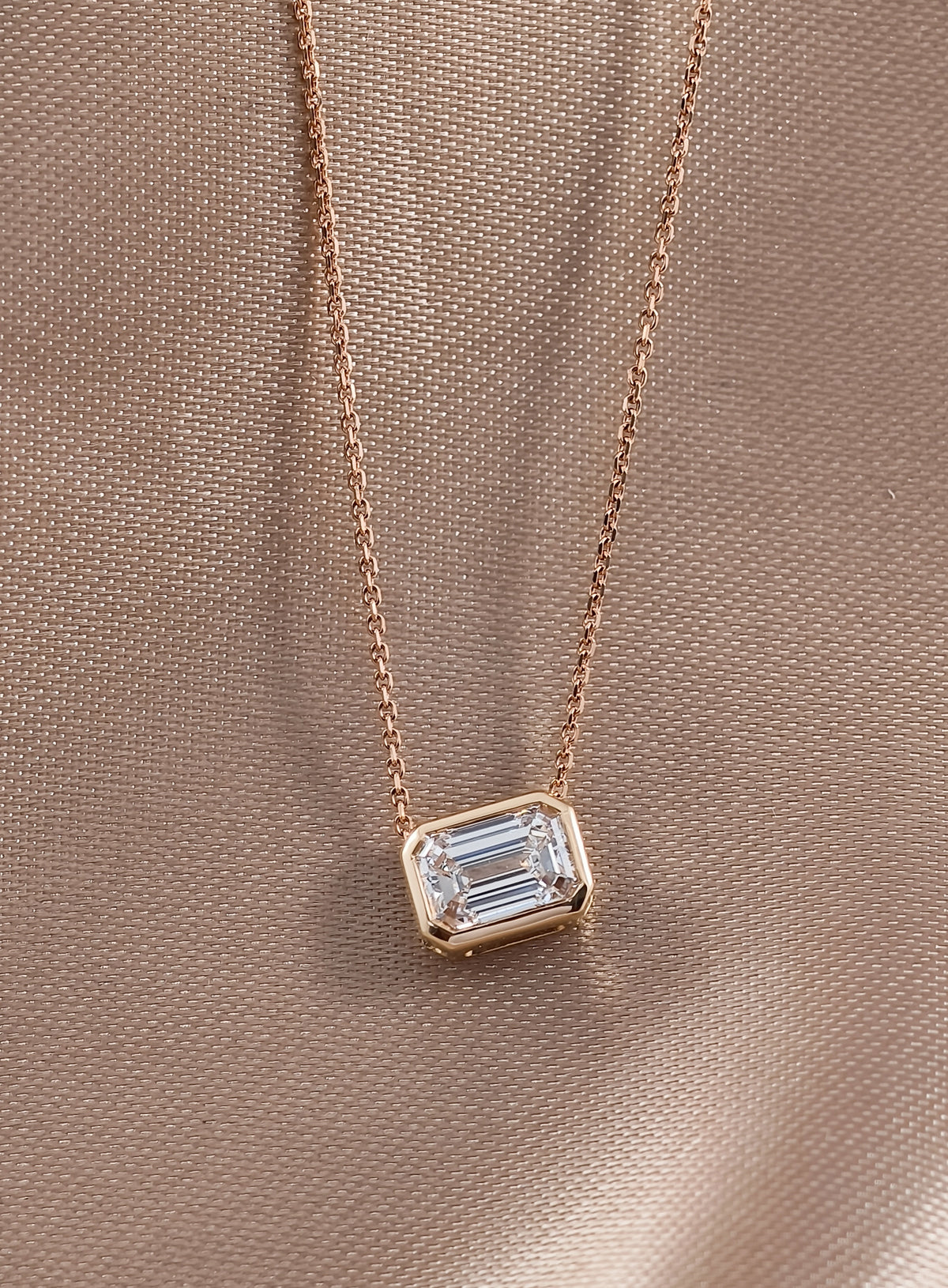Emerald cut Diamond Pendant Necklace in Bezel setting
