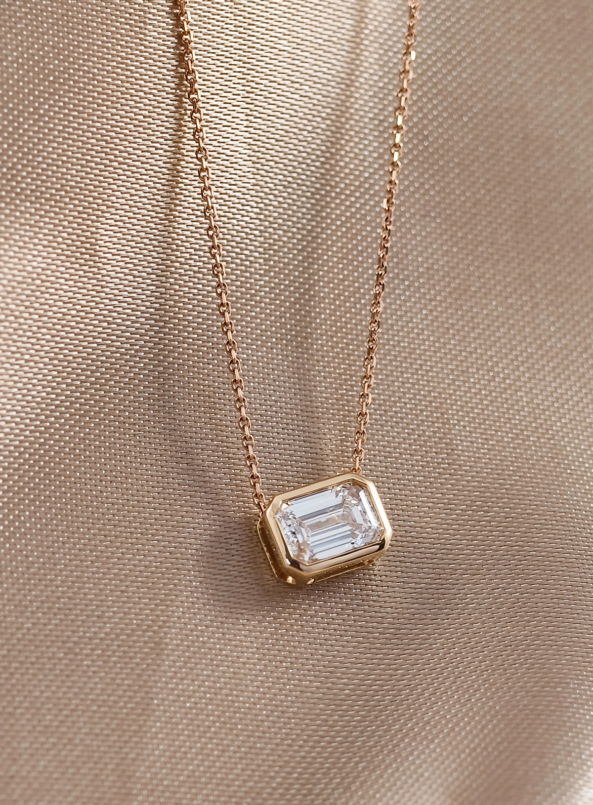 Emerald cut Diamond Pendant Necklace in Bezel setting