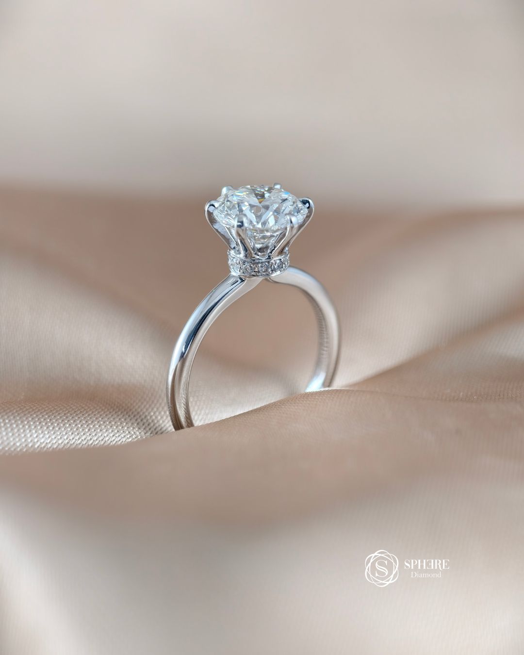 Angled view of Celeste Round Lab Grown Diamond Cathedral Solitaire Engagement Ring with Hidden Wrap | IGI Certified