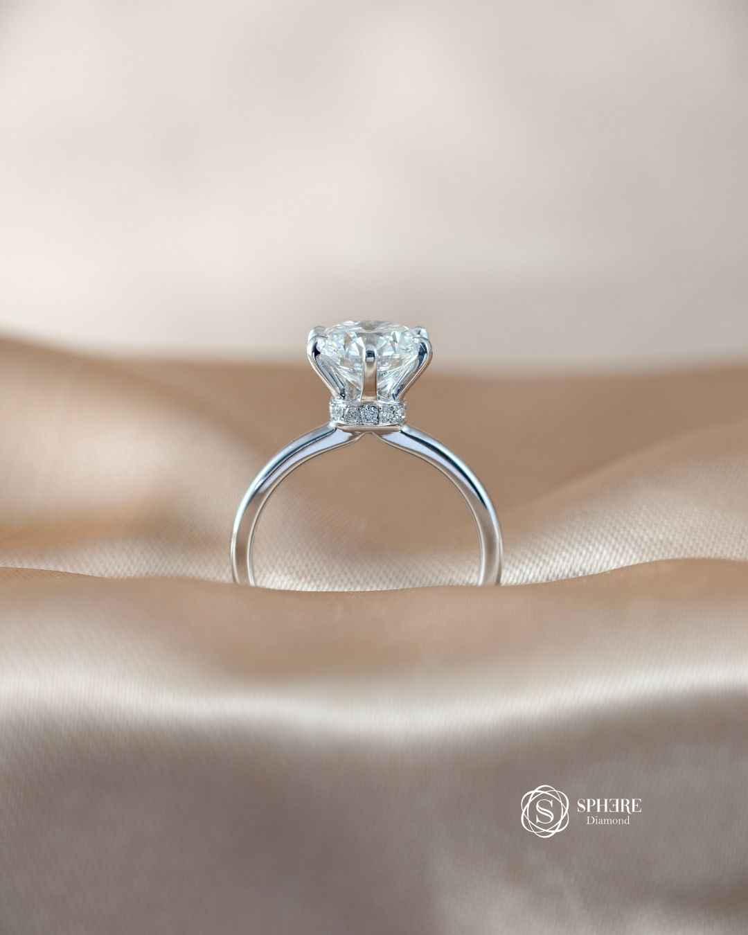 Side profile of Celeste Round Lab Grown Diamond Engagement Ring featuring Cathedral Setting and Hidden Wrap | IGI Certified