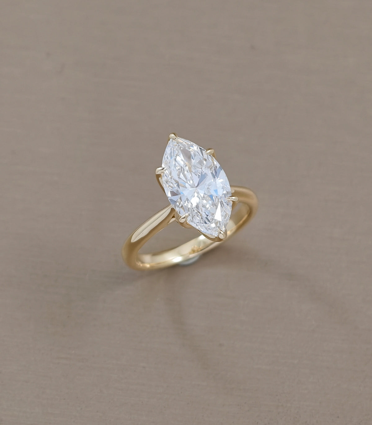 Classic Marquise Solitaire Lab Grown Diamond Ring in Yellow Gold Angled View