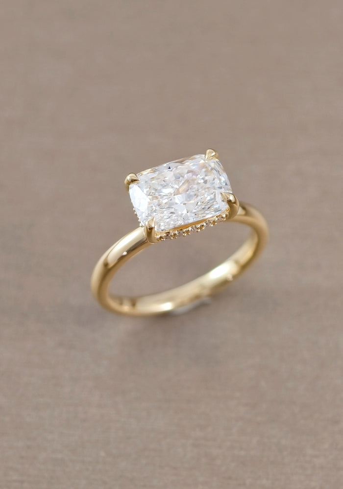 East-west cushion cut lab grown diamond ring