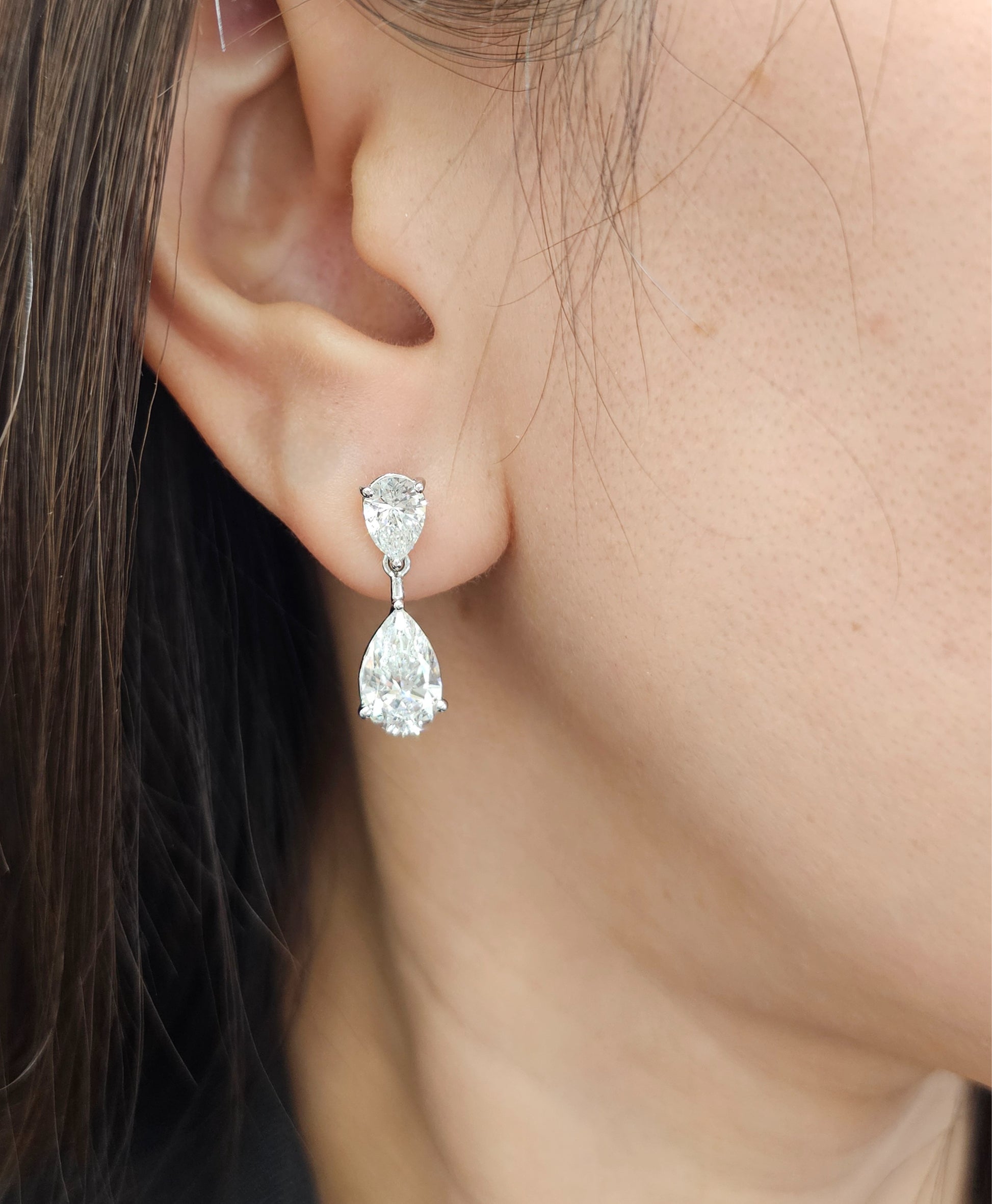 Model wearing Elara Double Pear Lab Grown Diamond Drop Earrings featuring IGI Certified Lab Grown Diamonds