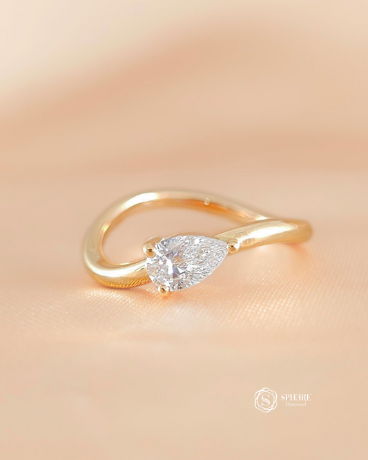Pear lab grown diamond curved bypass engagement ring in Bangkok by Sphere Diamond