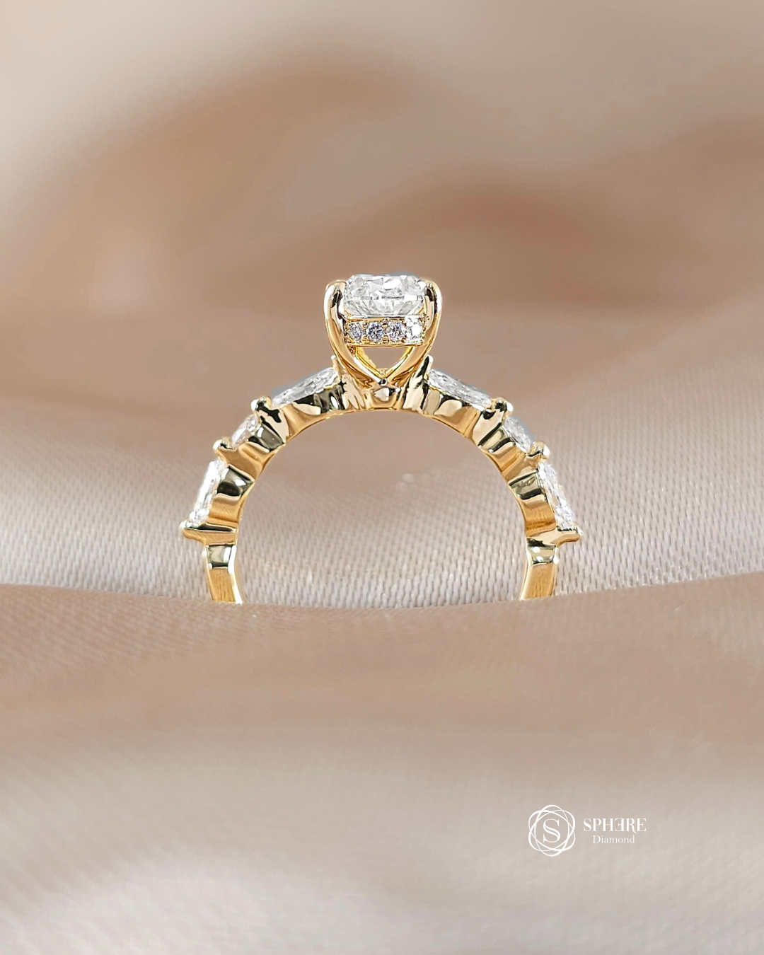 Side profile of the Emily Oval Lab Grown Diamond Engagement Ring with marquise side stones and 18K Pink Gold setting