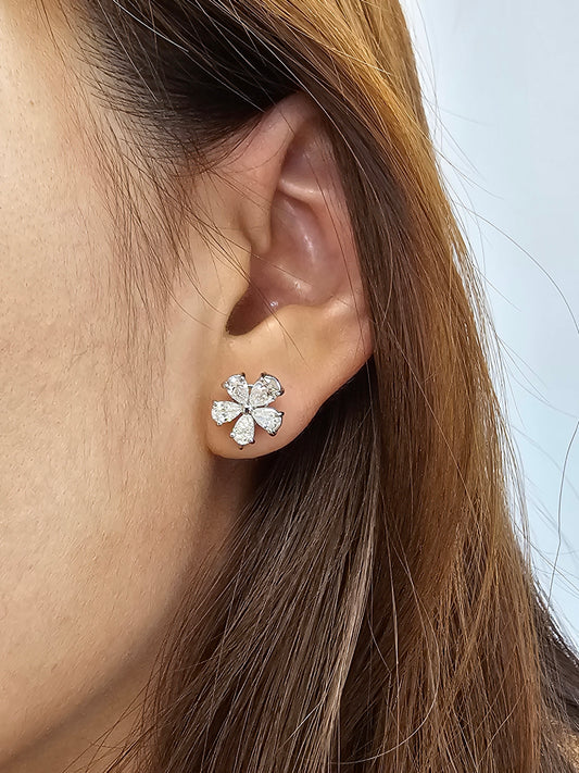 Model wearing Floral Blossom pear lab grown diamond stud earrings by Sphere Diamond Bangkok