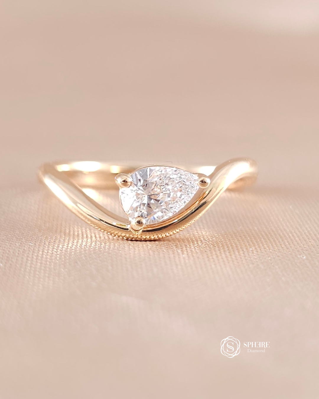 Pear lab grown diamond curved engagement ring in Bangkok by Sphere Diamond