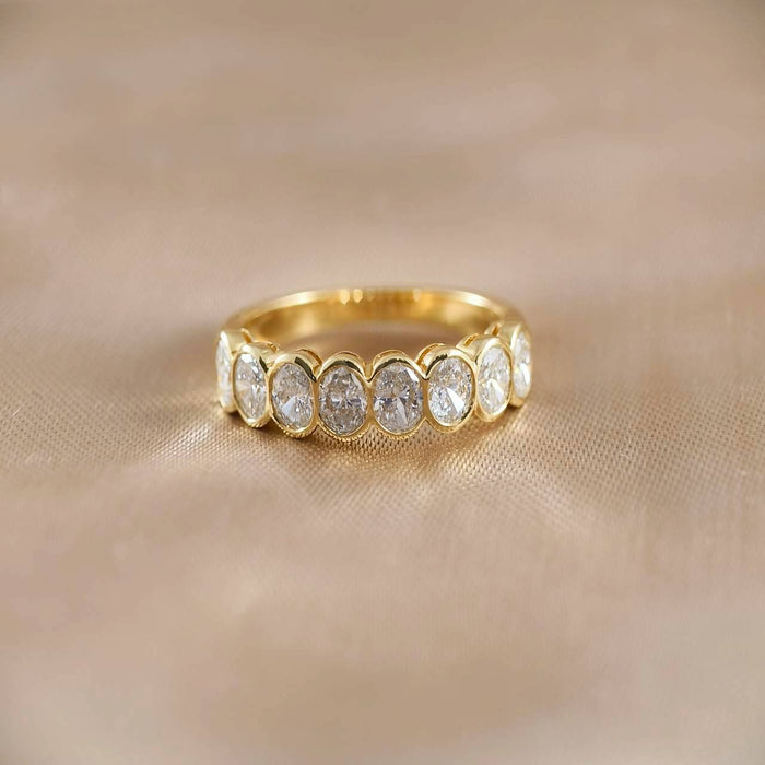 Oval Half Eternity Bezel Lab Grown Diamond Ring in 18K Yellow Gold by Sphere Diamond Bangkok featuring IGI Certified Oval Diamonds