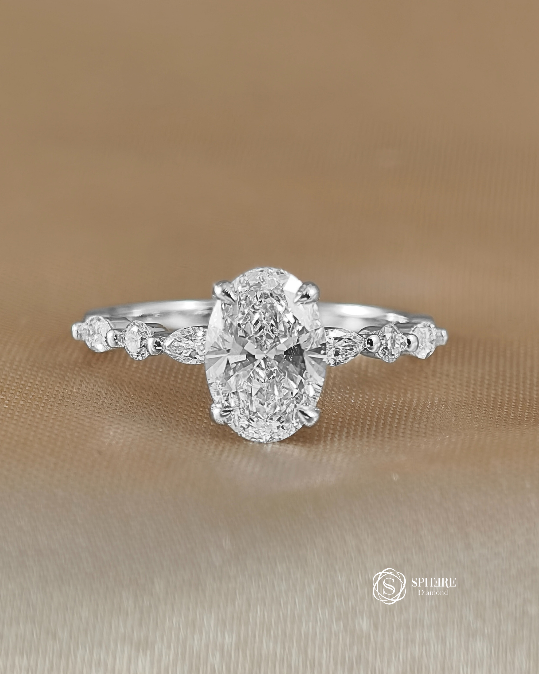 Oval Lab Grown Diamond Engagement Ring with Marquise Side Stones in 18K White Gold by Sphere Diamond Bangkok featuring an IGI Certified Oval Diamond