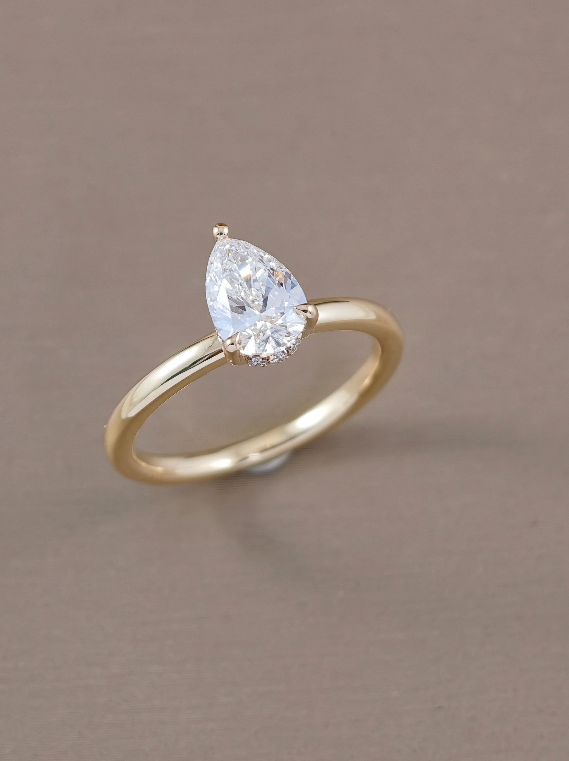 Pear Shape Lab Grown Diamond Solitaire Engagement Ring three quarter view