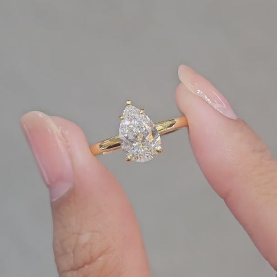 Pear Cut Lab Grown Diamond Ring on hand Sphere Diamond Bangkok Thailand