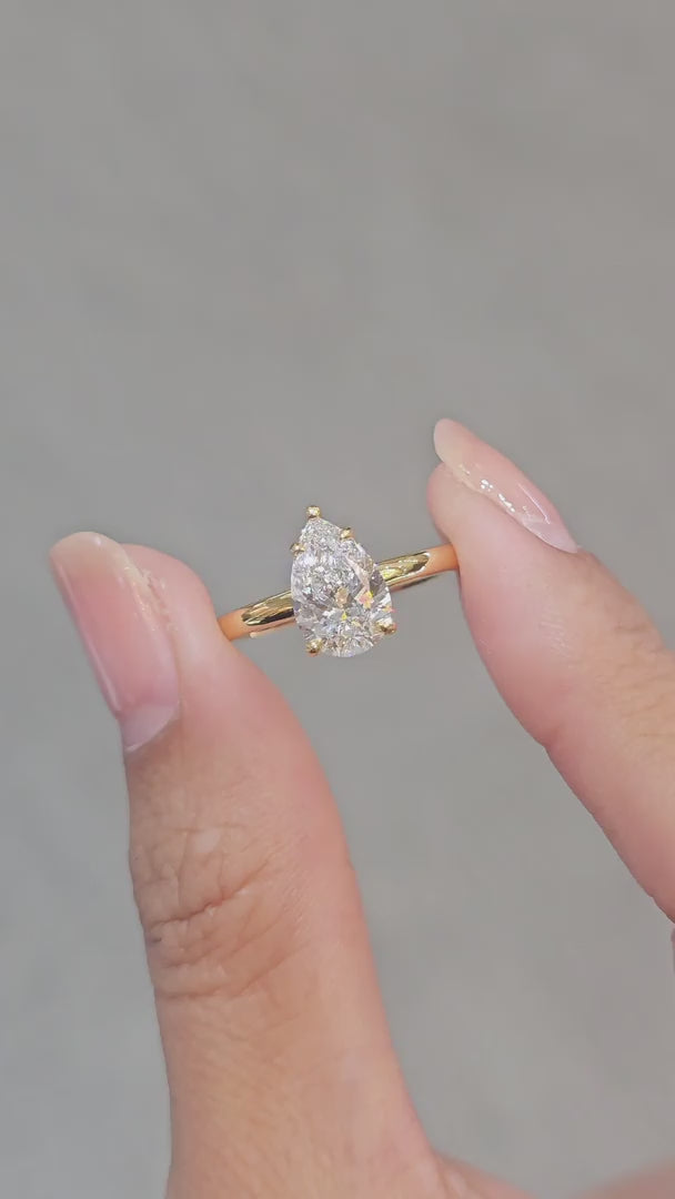 Pear Cut Lab Grown Diamond Ring on hand Sphere Diamond Bangkok Thailand