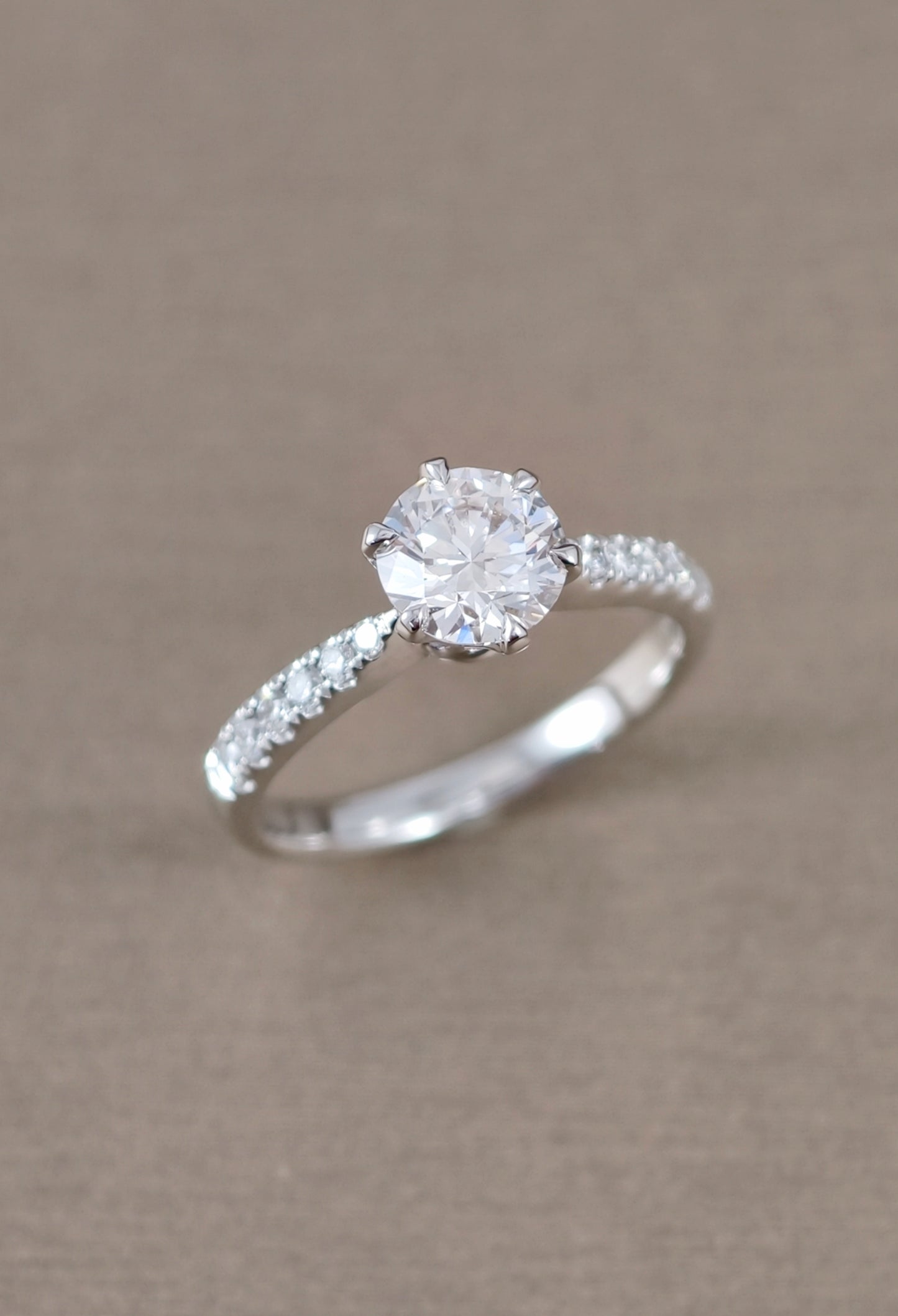 Six prong lab grown diamond ring with pave setting