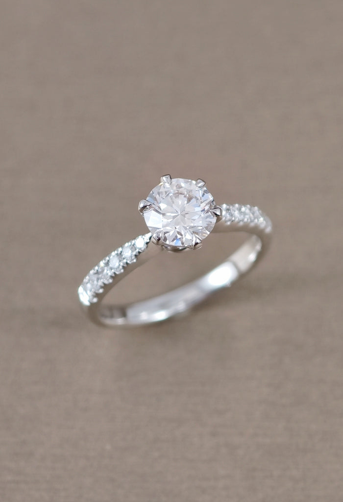 Six prong lab grown diamond ring with pave setting
