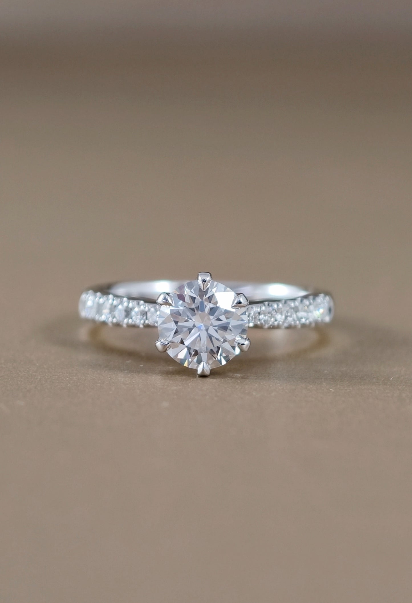 Six prong lab grown diamond ring with pave setting