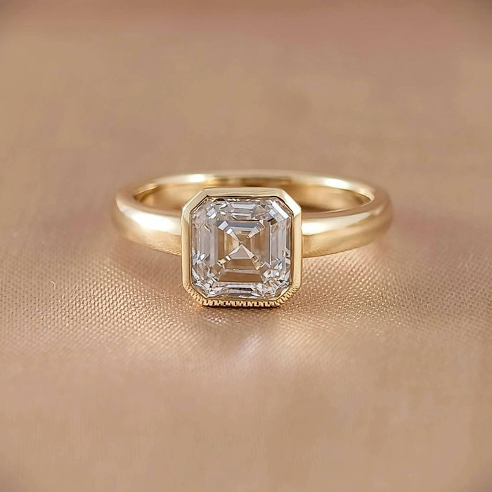Front view of Signature Aurelia Asscher Lab Grown Diamond Bezel Engagement Ring in 18K Yellow Gold | IGI Certified | Sphere Diamond Bangkok