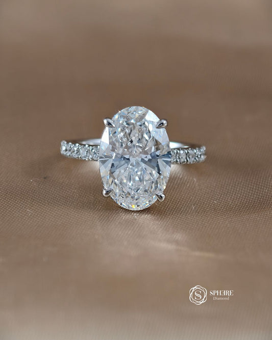 Signature Eiffel Love Oval Lab Grown Diamond Engagement Ring by Sphere Diamond Bangkok featuring an IGI Certified oval diamond in an elegant pavé band 18K white gold setting.