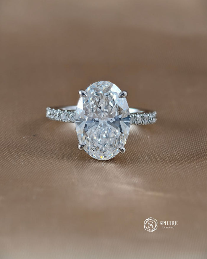 Signature Eiffel Love Oval Lab Grown Diamond Engagement Ring by Sphere Diamond Bangkok featuring an IGI Certified oval diamond in an elegant pavé band 18K white gold setting.